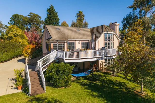 a view of a city with mountains in the background