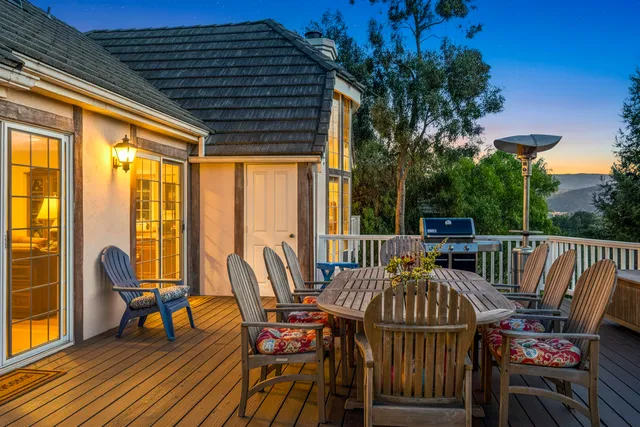 a view of balcony with outdoor seating