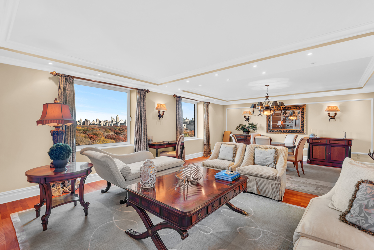160 Central Park South, Unit 1015/1018 Manhattan, NY 10019 - Photo 9 of 10 a living room with furniture and a potted plant
