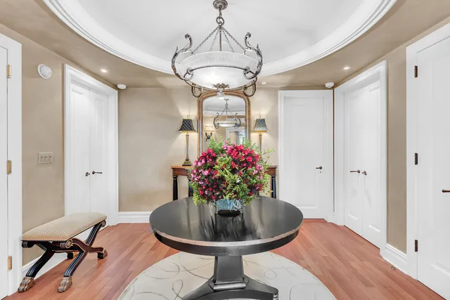 a kitchen with sink a center island and cabinets