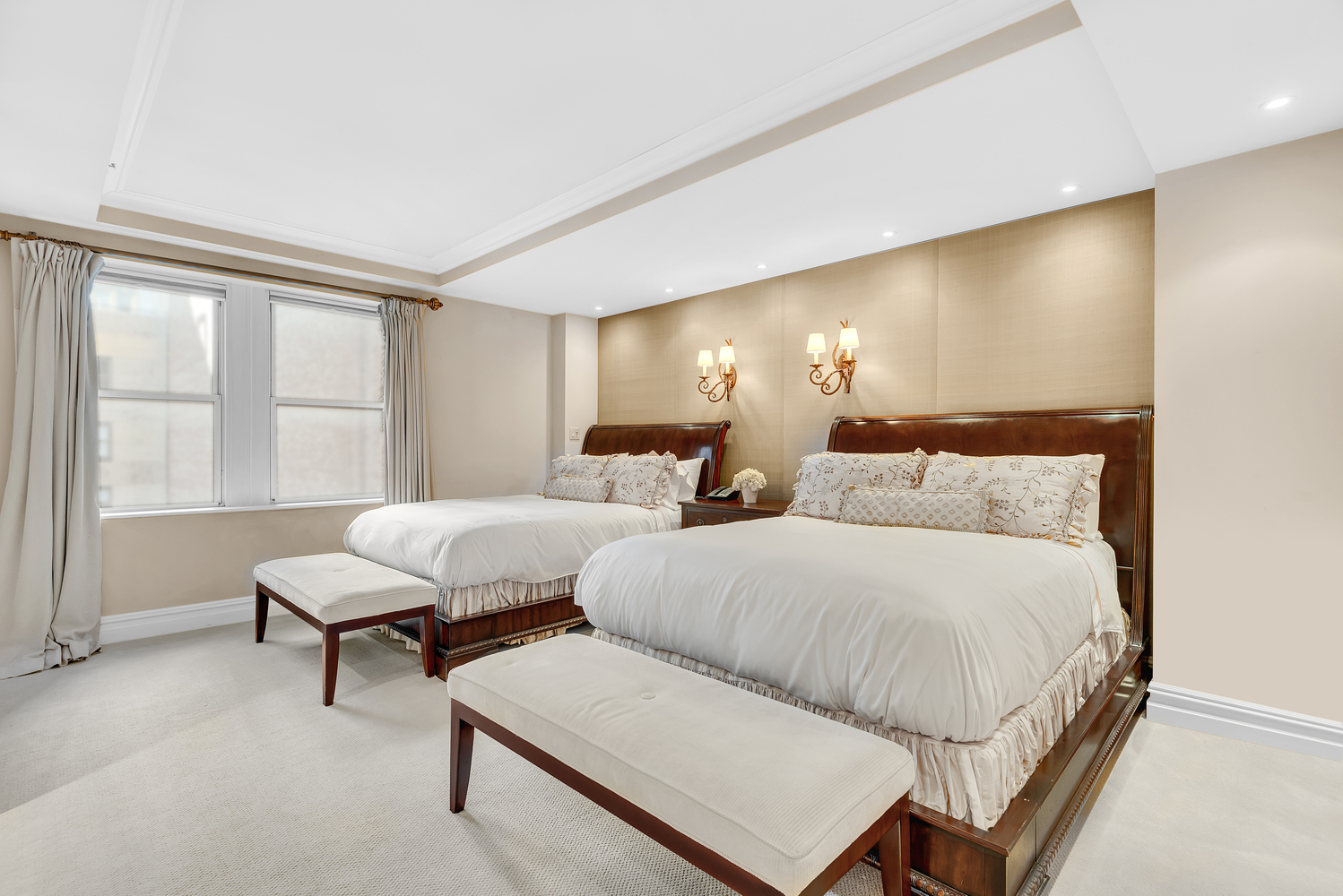 160 Central Park South, Unit 1015/1018 Manhattan, NY 10019 - Photo 6 of 10 a bedroom with two beds and windows