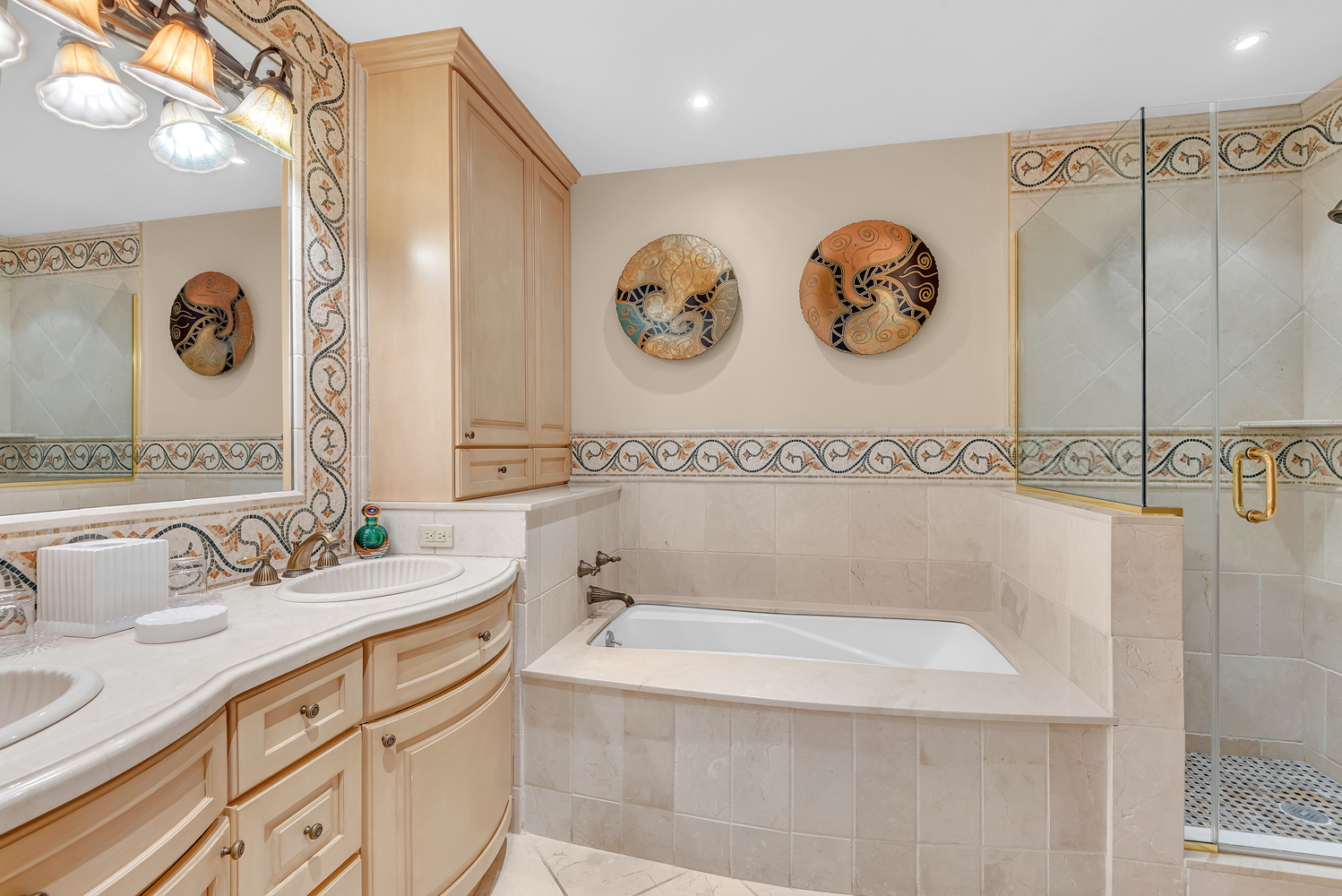 160 Central Park South, Unit 1015/1018 Manhattan, NY 10019 - Photo 7 of 10 a bathroom with a sink and a mirror