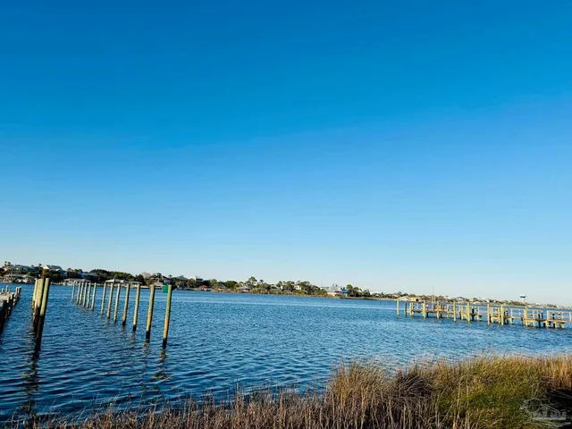 a view of a lake with houses in outdoor space