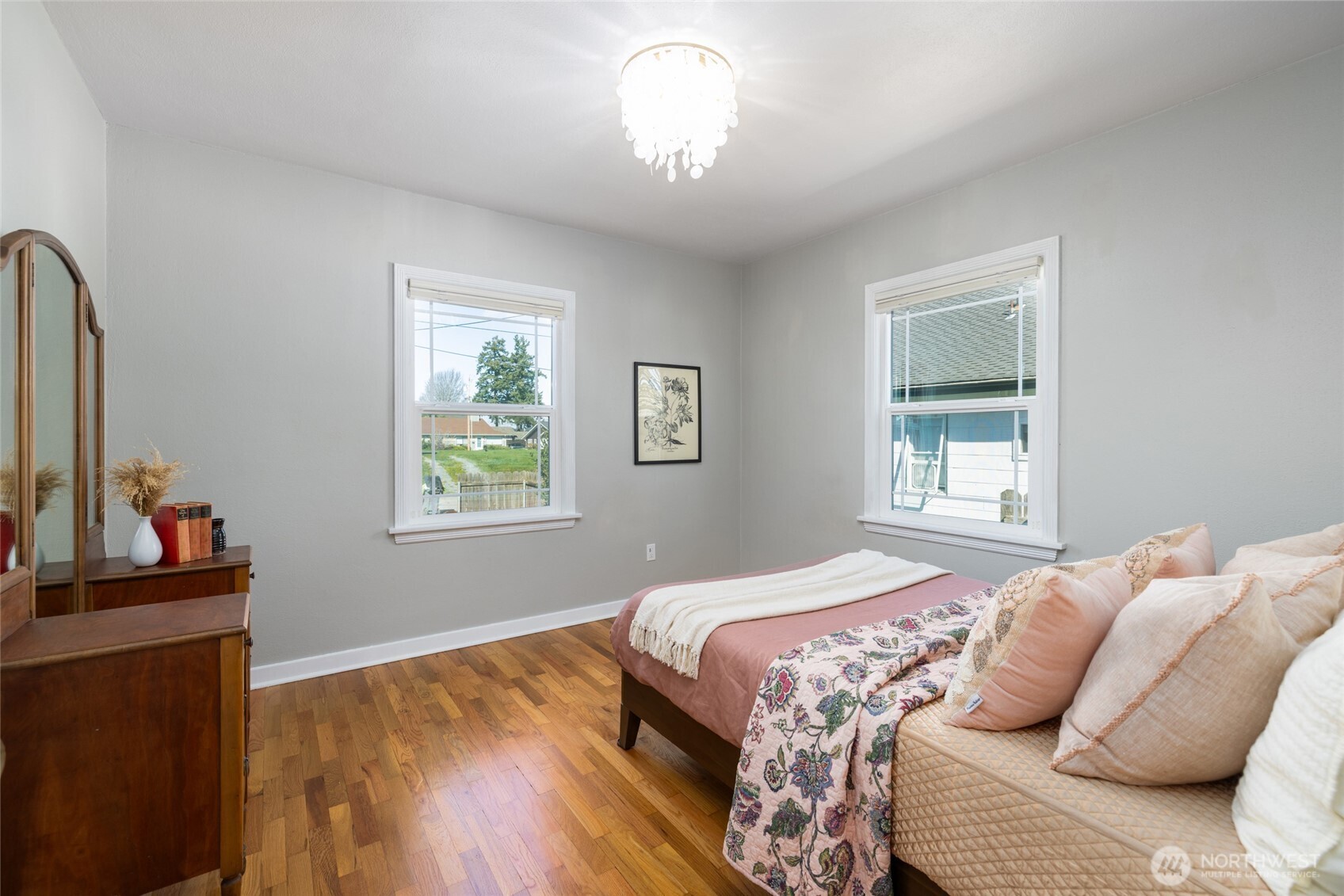 819 K Avenue Anacortes, WA 98221 - Photo 21 of 40 a bedroom with a bed and a window