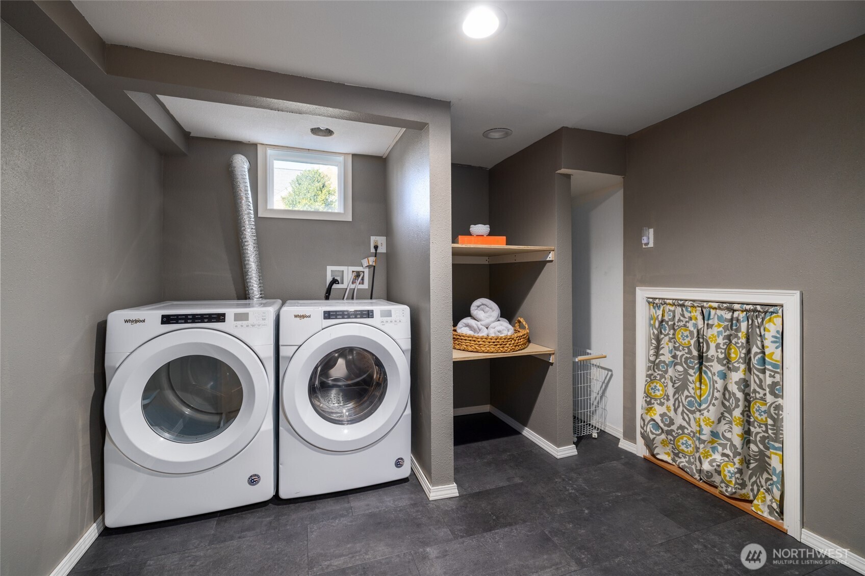 819 K Avenue Anacortes, WA 98221 - Photo 30 of 40 a utility room with dryer and washer