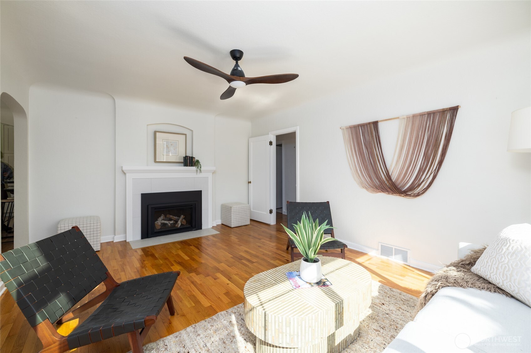 819 K Avenue Anacortes, WA 98221 - Photo 7 of 40 a living room with furniture and a fireplace