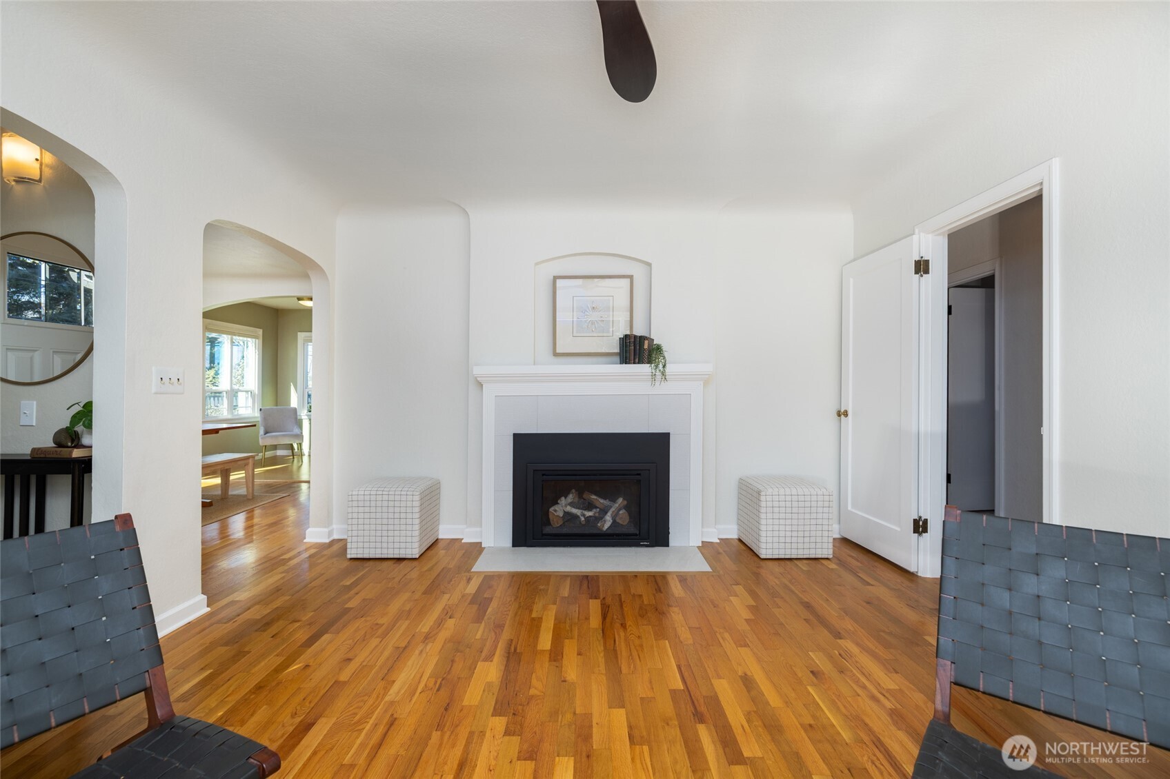 819 K Avenue Anacortes, WA 98221 - Photo 8 of 40 a living room with furniture and a fireplace