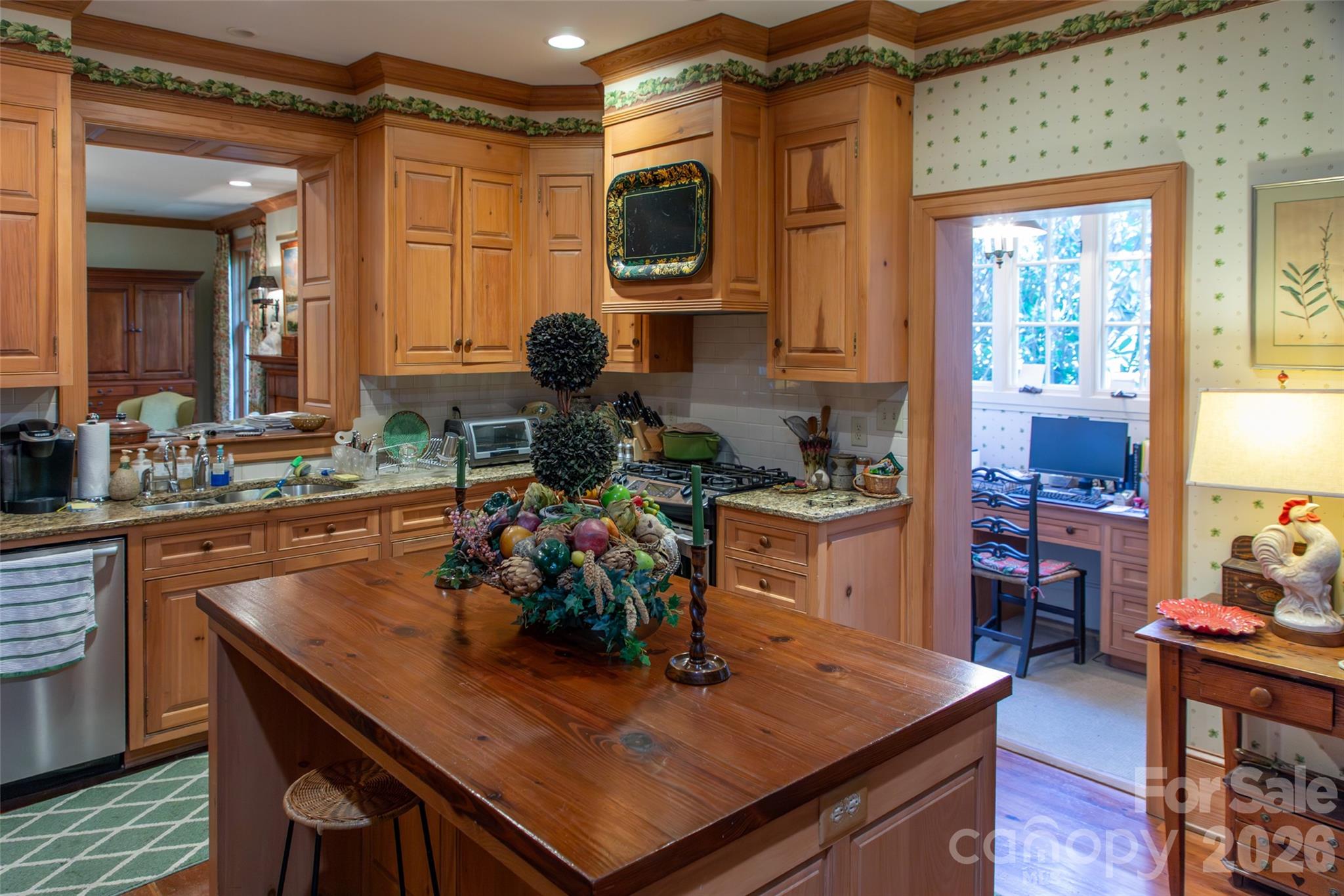 213 Union Street North Concord, NC 28025 - Photo 25 of 43 a kitchen with a table and chairs in it
