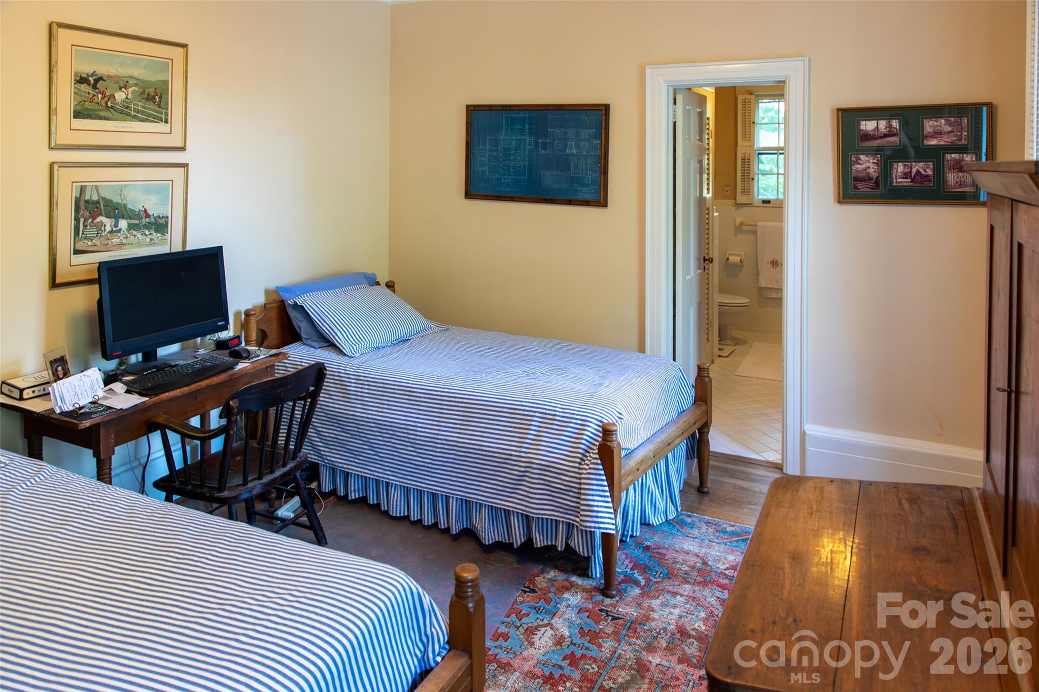 213 Union Street North Concord, NC 28025 - Photo 27 of 43 a bedroom with bed and a desk