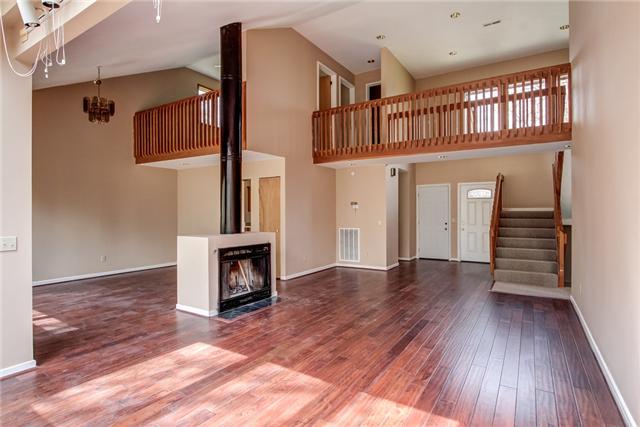 4259 Crowder Road Franklin, TN 37064 - Photo 4 of 18 New hardwoods in open great room with vaulted ceilings and sky lights