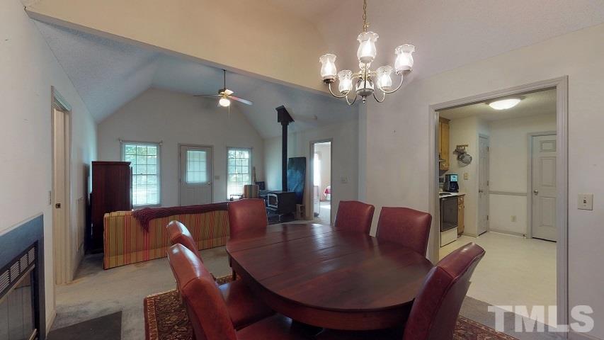 6720 Kiger Road Rougemont, NC 27572 - Photo 15 of 22 a view of a dining room with furniture