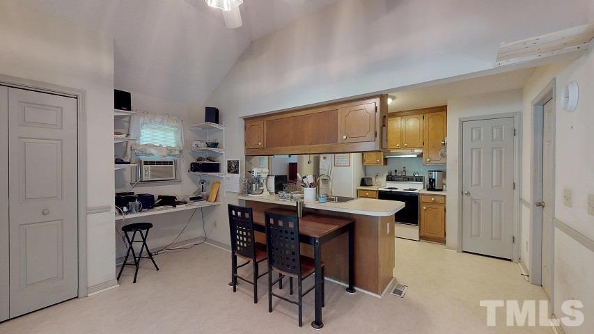 6720 Kiger Road Rougemont, NC 27572 - Photo 17 of 22 a kitchen with a table and chairs in it