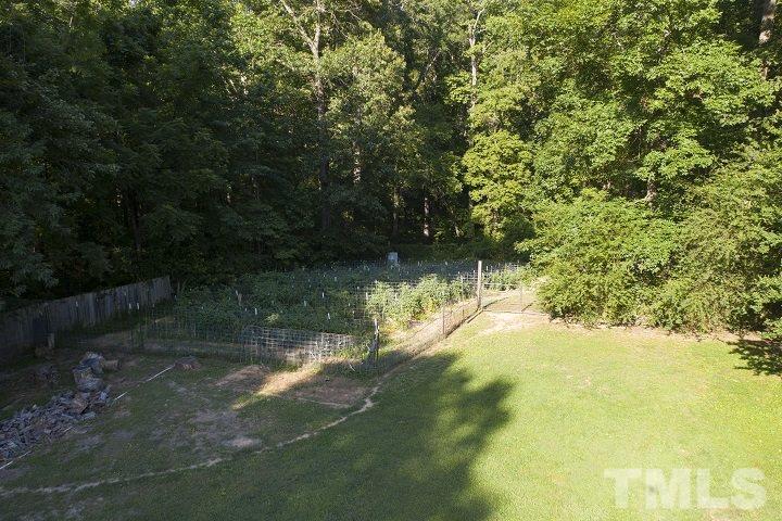 6720 Kiger Road Rougemont, NC 27572 - Photo 5 of 22 a view of lake background with a yard
