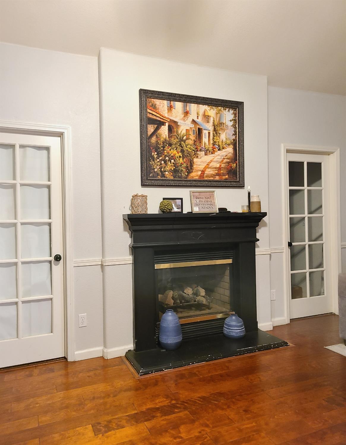 440 East Stanley Avenue Reedley, CA 93654 - Photo 11 of 25 a living room with a fireplace