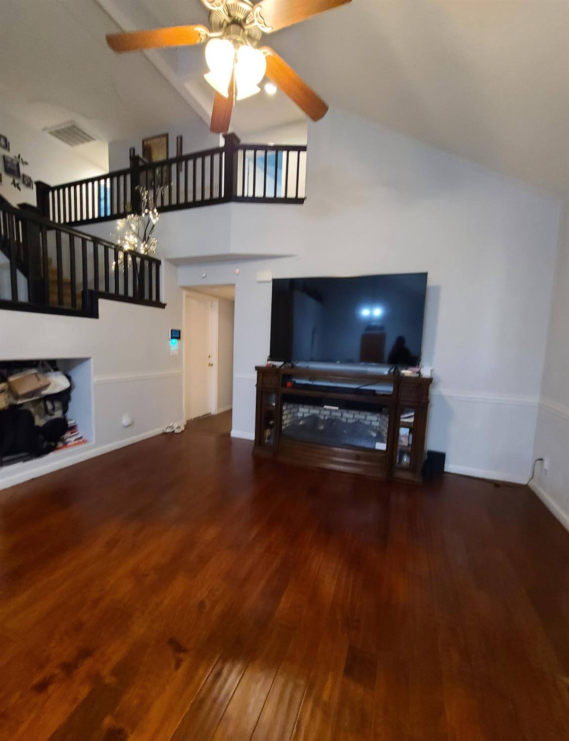 440 East Stanley Avenue Reedley, CA 93654 - Photo 6 of 25 a living room with furniture and a piano