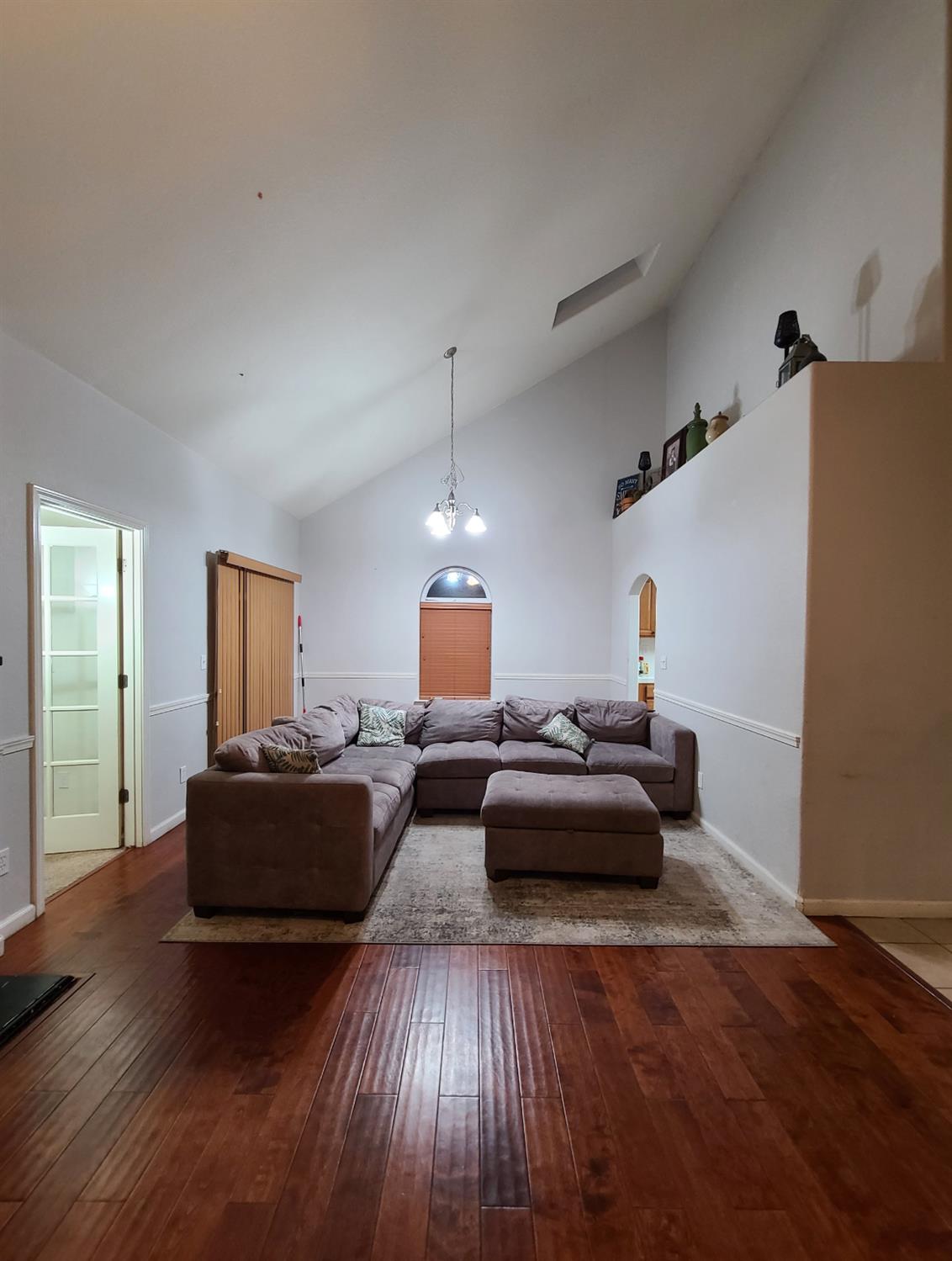 440 East Stanley Avenue Reedley, CA 93654 - Photo 9 of 25 a living room with furniture and wooden floor