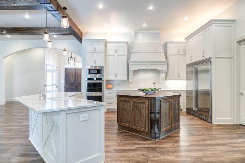 11107 Miami Avenue Lubbock, TX 79423 - Photo 17 of 82 a kitchen with stainless steel appliances granite countertop a sink stove and refrigerator
