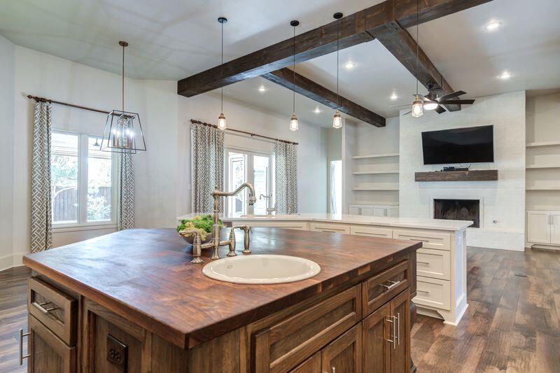 11107 Miami Avenue Lubbock, TX 79423 - Photo 27 of 82 a dining table with chairs and fireplace