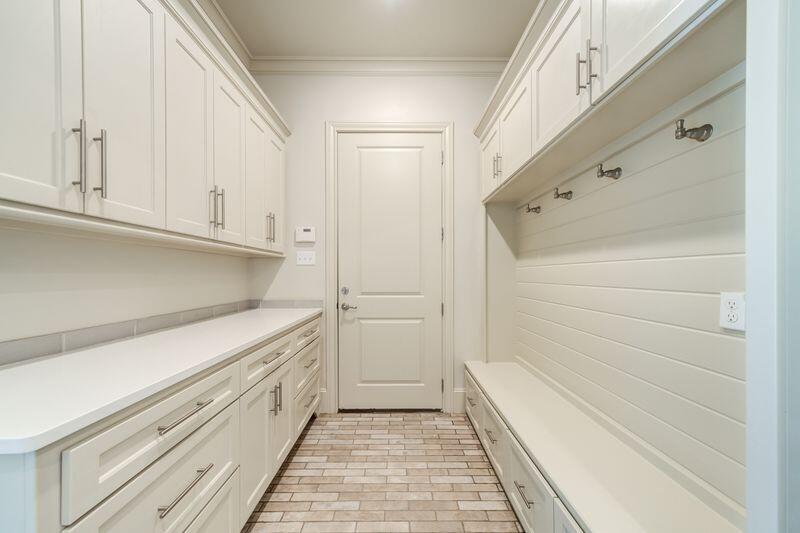 11107 Miami Avenue Lubbock, TX 79423 - Photo 32 of 82 a view of a kitchen with white cabinets