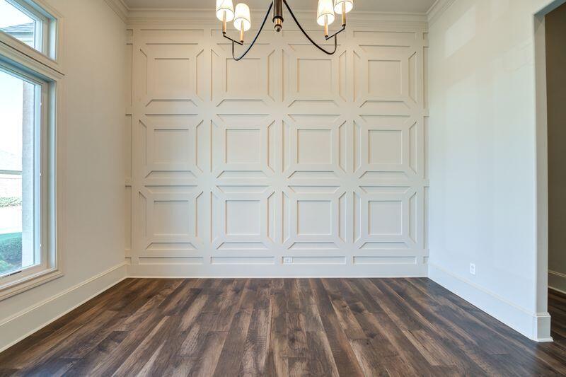 11107 Miami Avenue Lubbock, TX 79423 - Photo 4 of 82 a view of empty room with wooden floor and fan