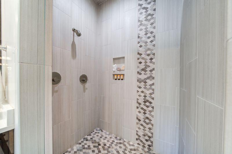 11107 Miami Avenue Lubbock, TX 79423 - Photo 44 of 82 a bathroom with a shower and a curtain