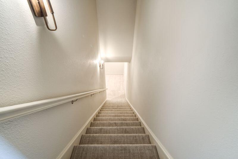 11107 Miami Avenue Lubbock, TX 79423 - Photo 63 of 82 a view of a hallway with staircase