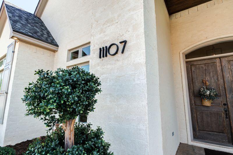 11107 Miami Avenue Lubbock, TX 79423 - Photo 70 of 82 a sign that is in front of a door