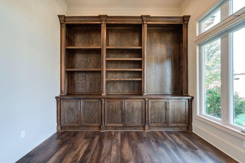 11107 Miami Avenue Lubbock, TX 79423 - Photo 7 of 82 a view of a house with a large window and wooden floor