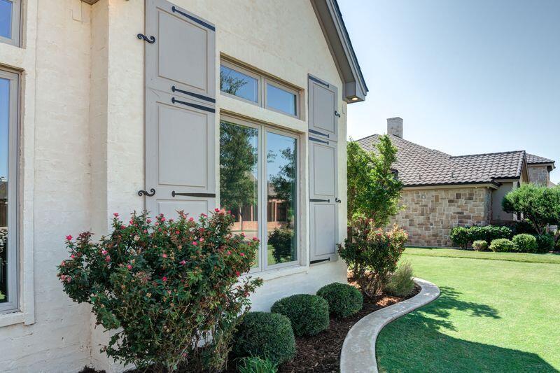 11107 Miami Avenue Lubbock, TX 79423 - Photo 71 of 82 front view of a house with a yard