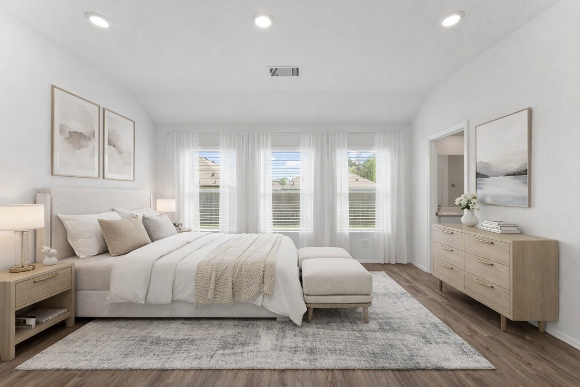 2850 Paradise Ridge Way Conroe, TX 77301 - Photo 10 of 22 a bedroom with a large bed and a window