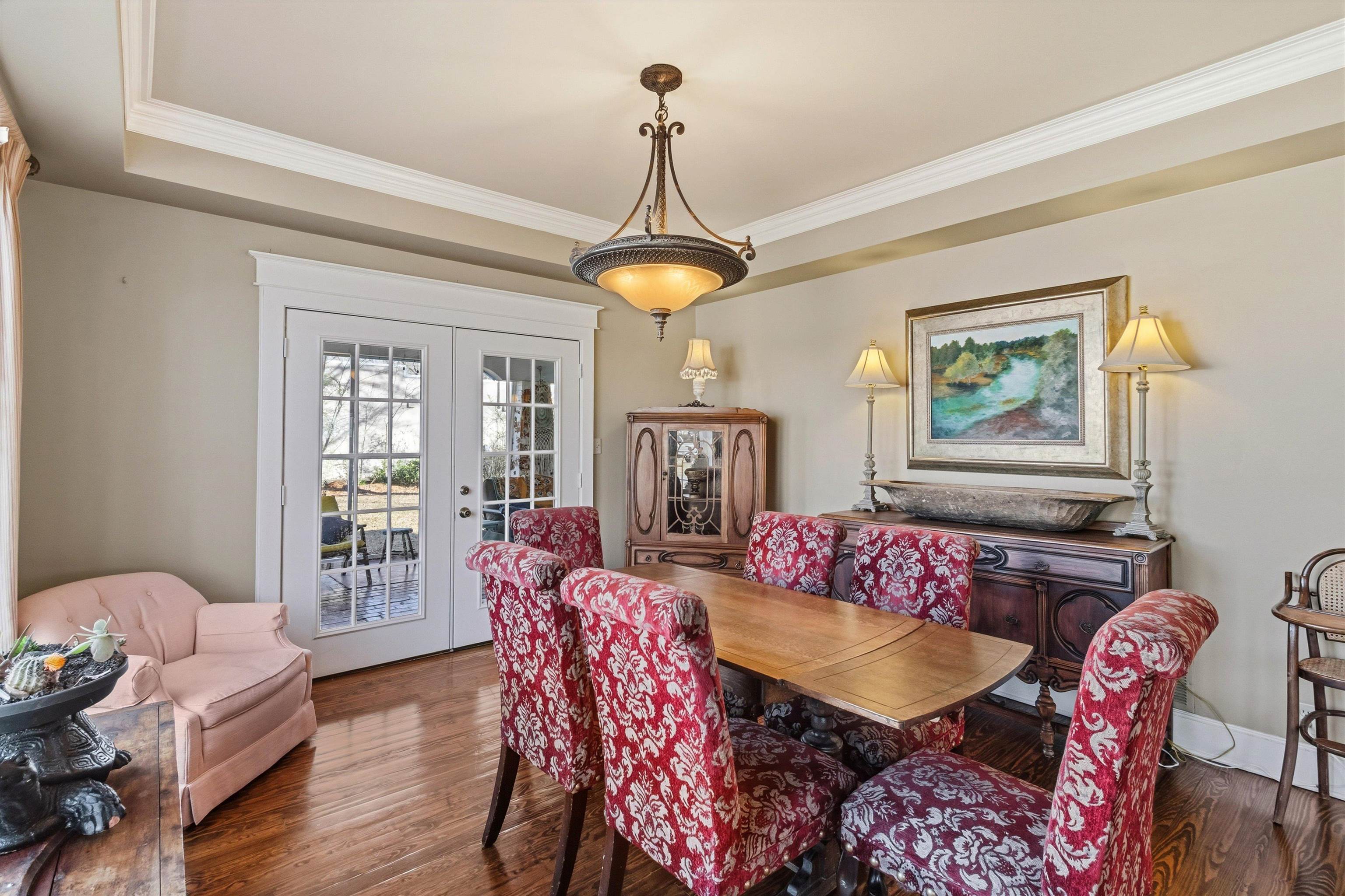 30 Front Street Rossville, TN 38066 - Photo 2 of 39 Dining space featuring french doors, wood finished floors, ornamental molding, and a tray ceiling