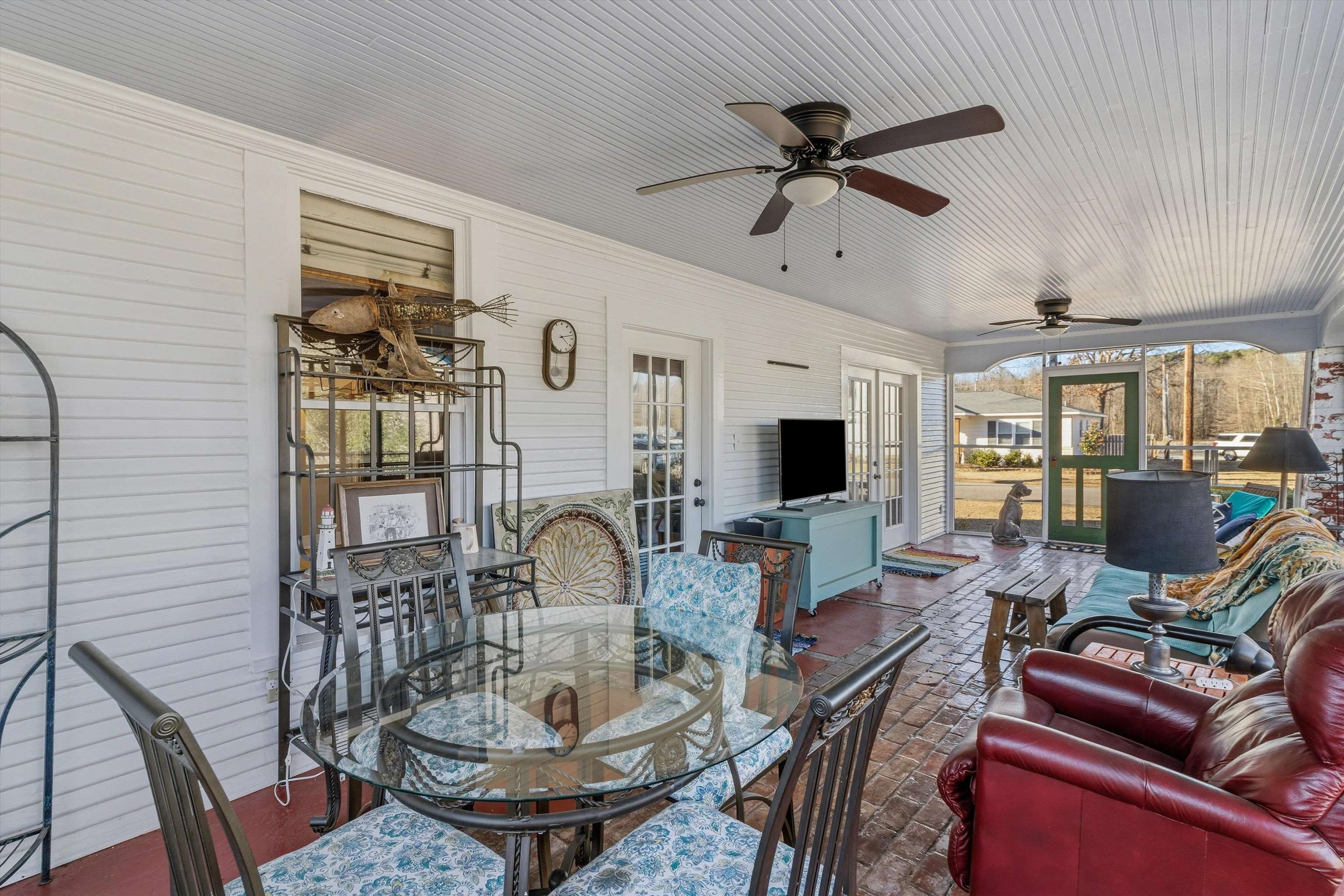 30 Front Street Rossville, TN 38066 - Photo 4 of 39 Porch has two sets of doors to access the primary bedroom and dining room