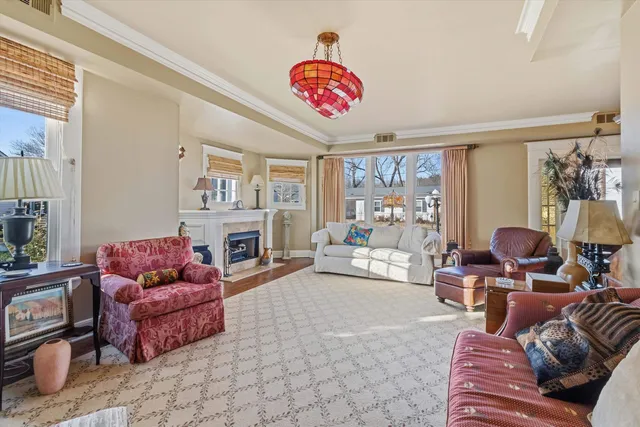 a living room with furniture or couch and a large window