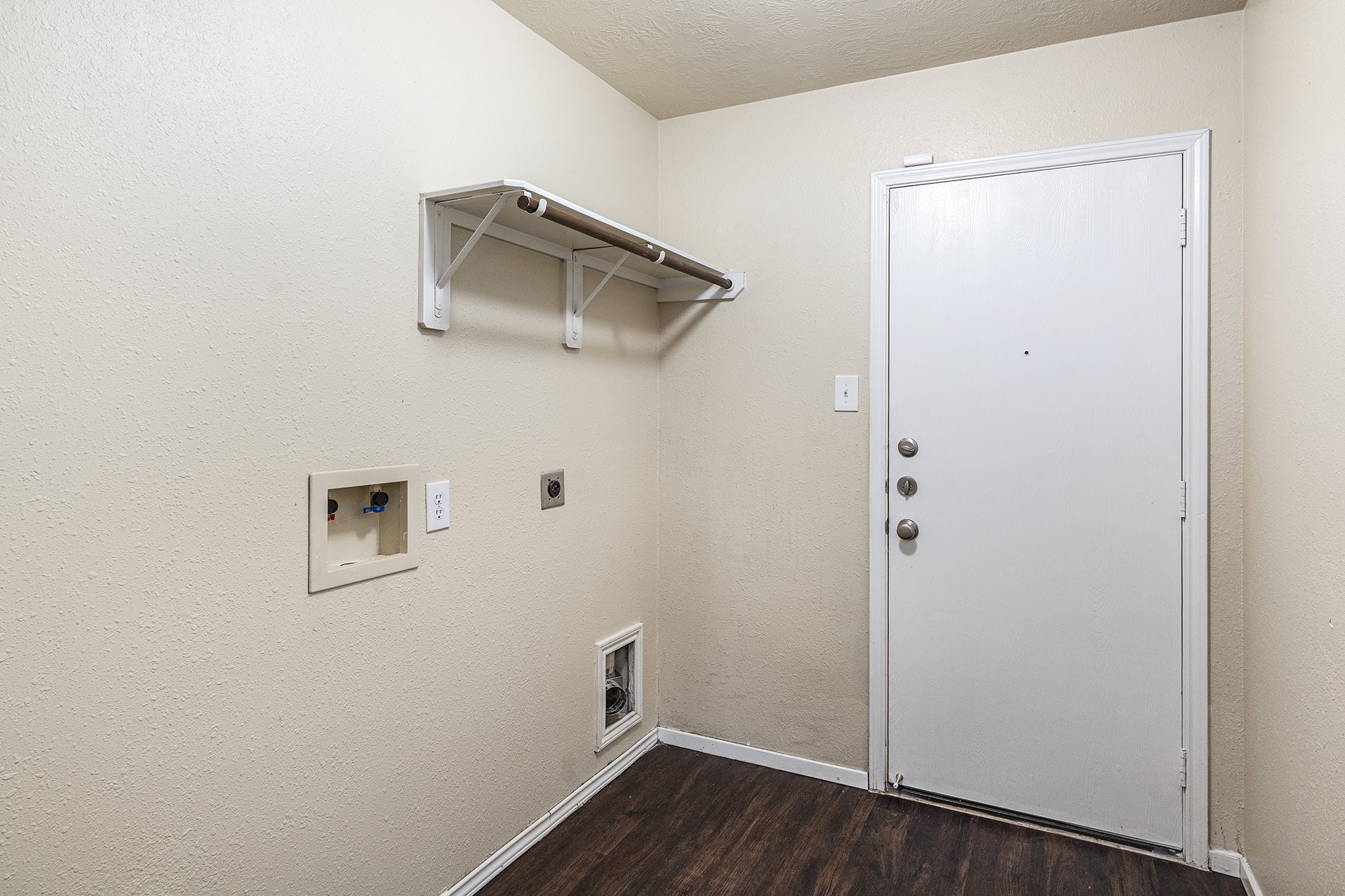 18227 Thicket Grove Road Houston, TX 77084 - Photo 18 of 28 a view of a hallway with wooden floor