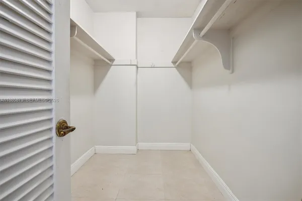 a view of an empty walk in closet