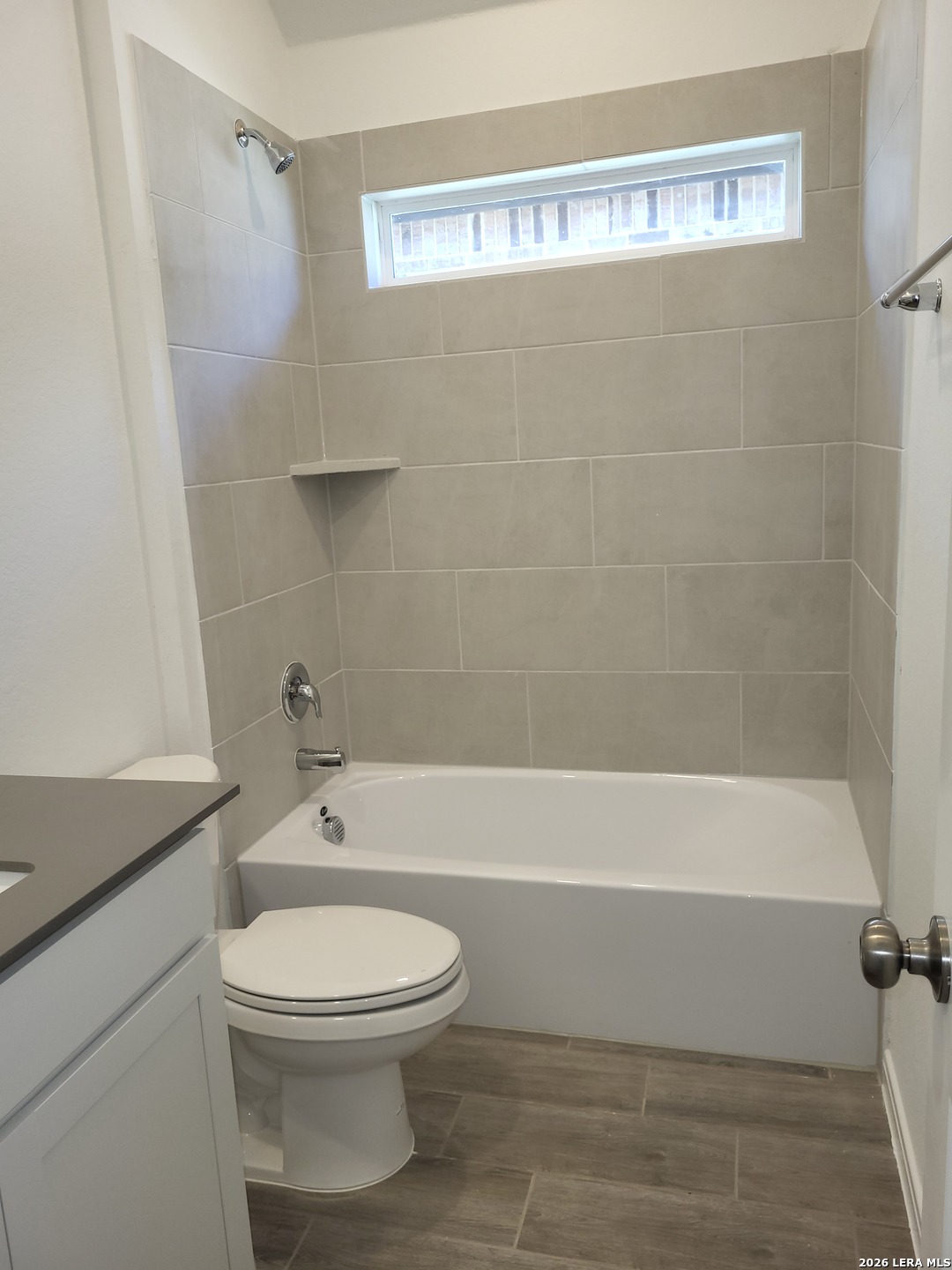 1233 Fox Wing Way New Braunfels, TX 78132 - Photo 10 of 19 a bathroom with a toilet and a shower