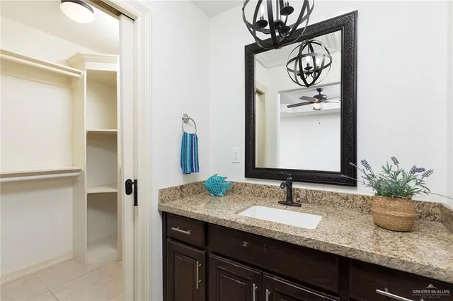 a view of a big room with wooden floor closet and windows