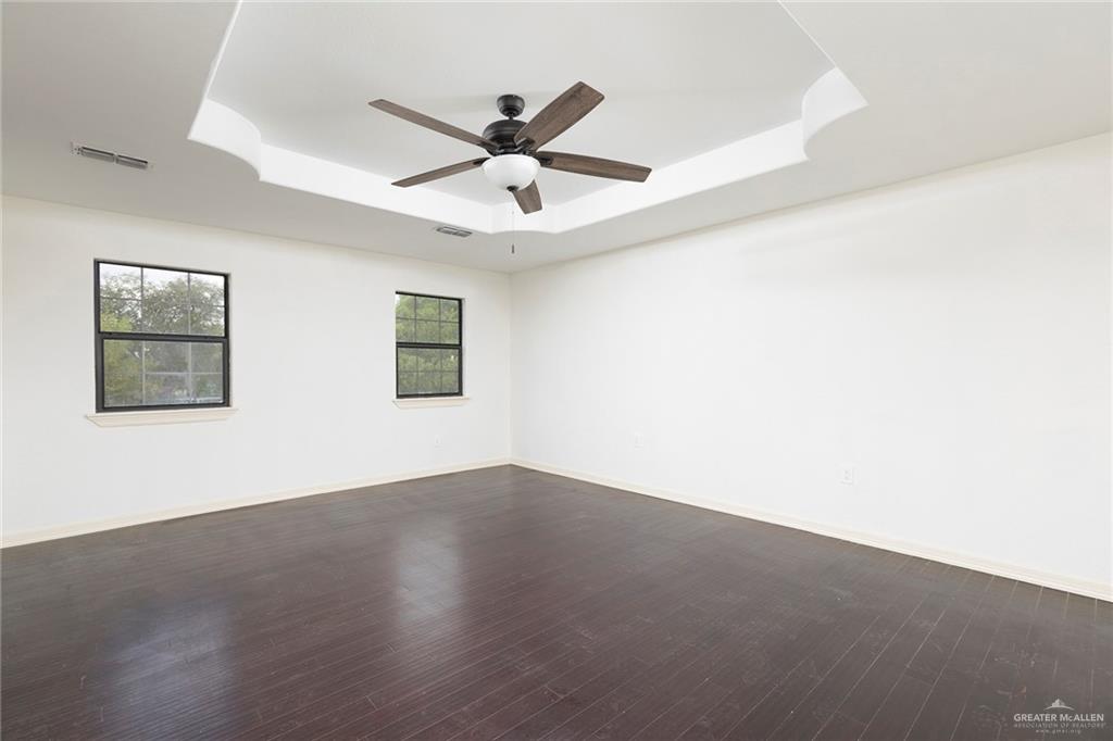1312 North 5th Street McAllen, TX 78501 - Photo 13 of 25 With high ceilings and hardwood floors, it’s both stylish and comfortable. Lots of space!