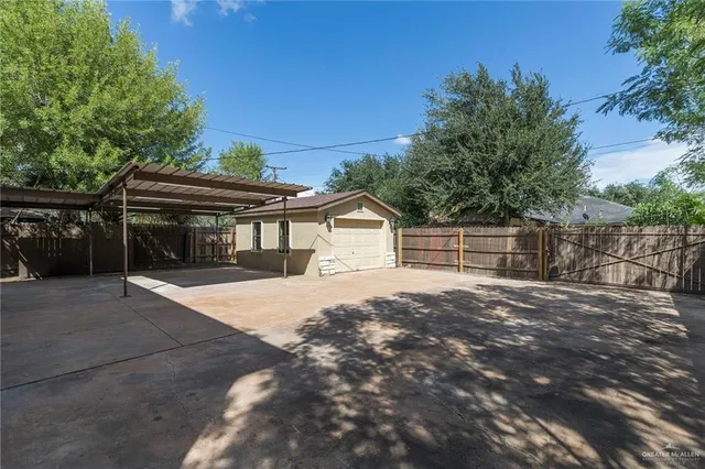 a view of backyard with tree