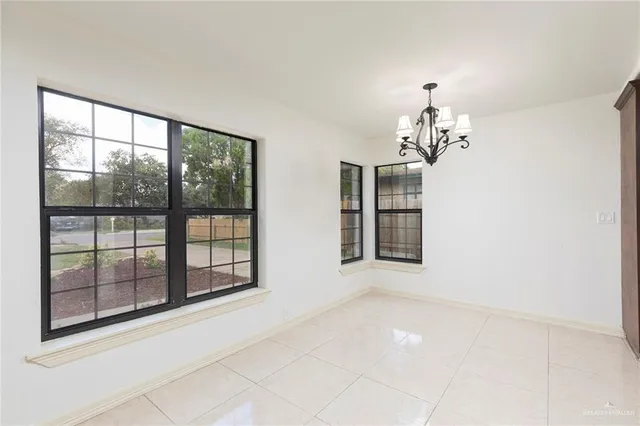 a kitchen with a sink and a window