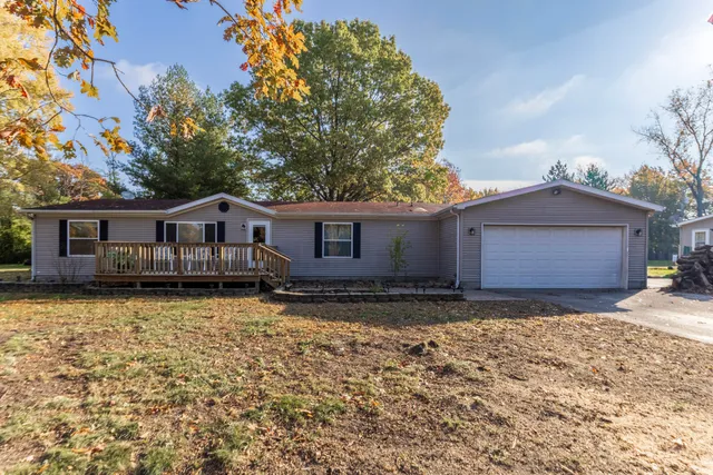 a front view of a house with yard