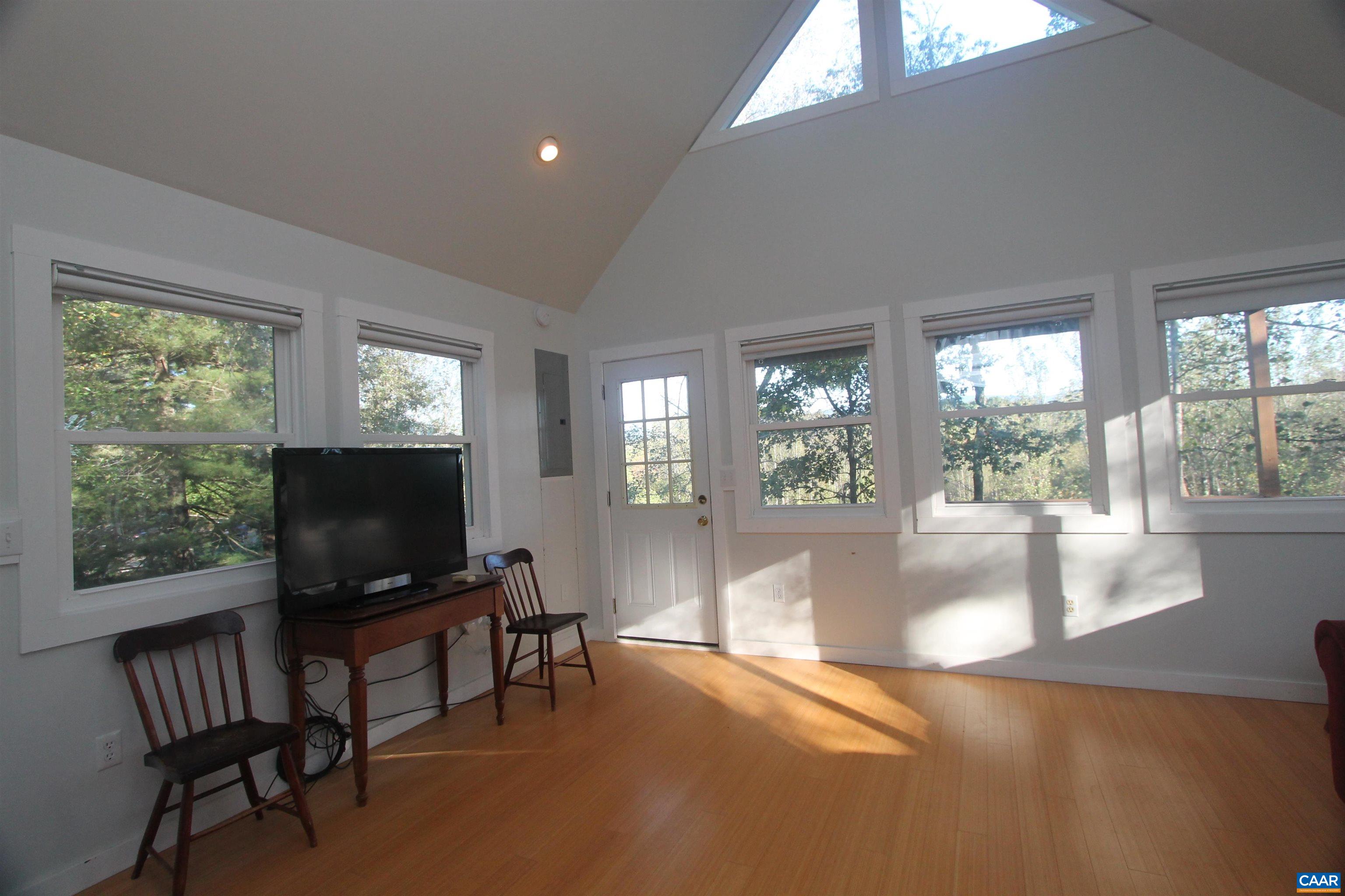 Tbd Batesville Road Afton, VA 22920 - Photo 13 of 28 a living room with fireplace furniture and a flat screen tv