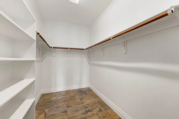 a view of a room with racks on the wall