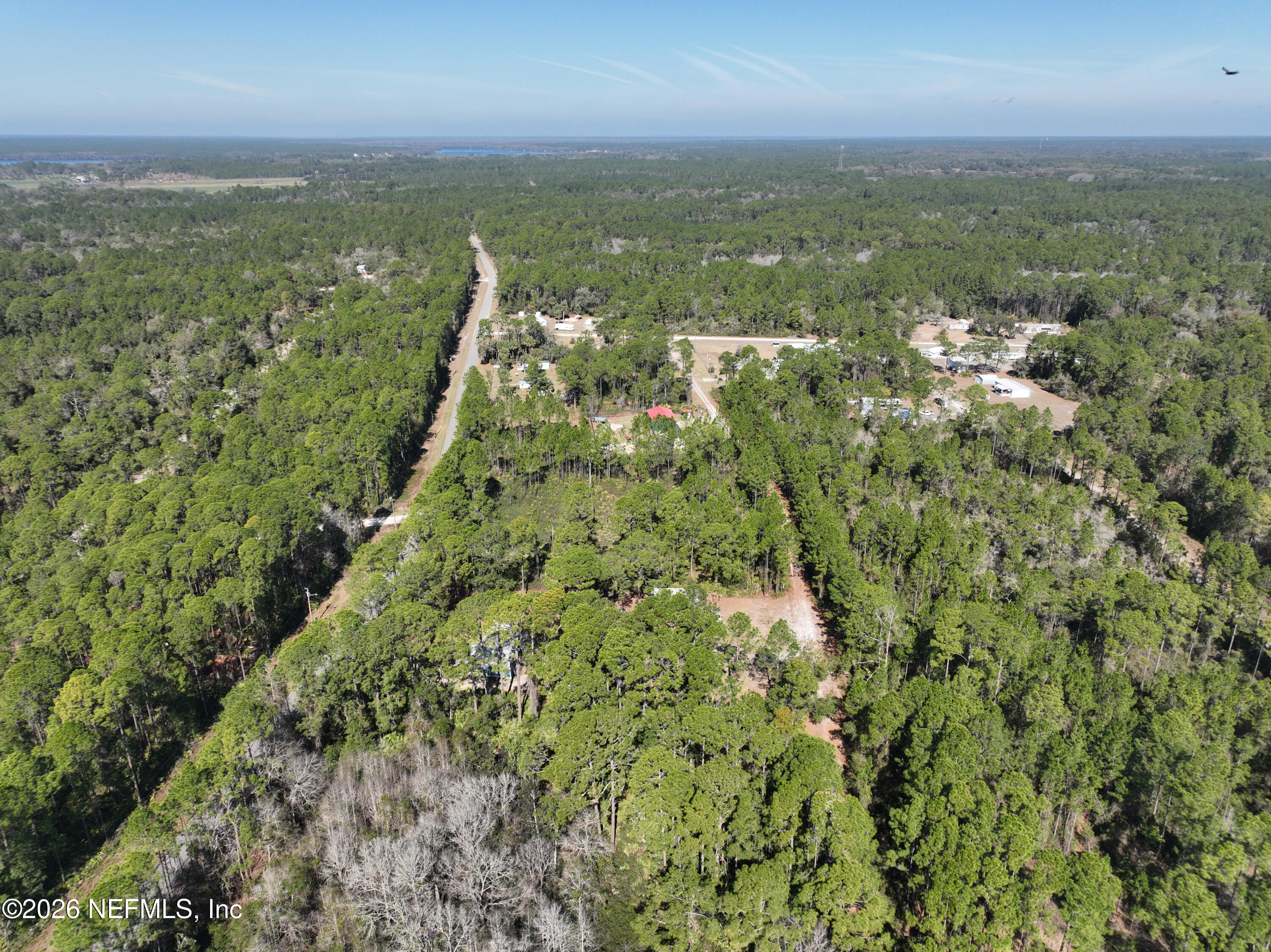 127 Roebuck Road Georgetown, FL 32139 - Photo 5 of 25 a view of a city with lush green forest