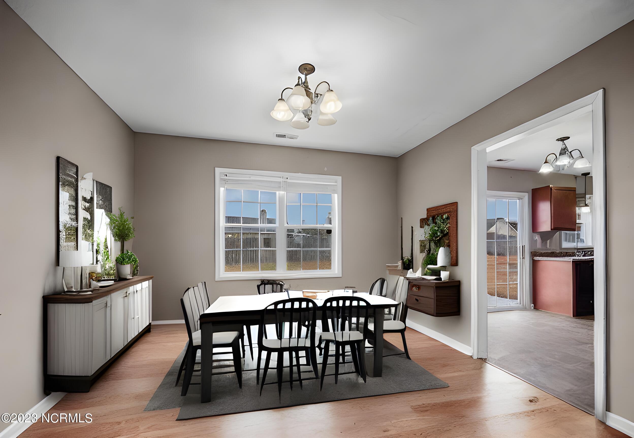 163 Queens Haven Road Hubert, NC 28539 - Photo 6 of 33 Virtually Staged dining room