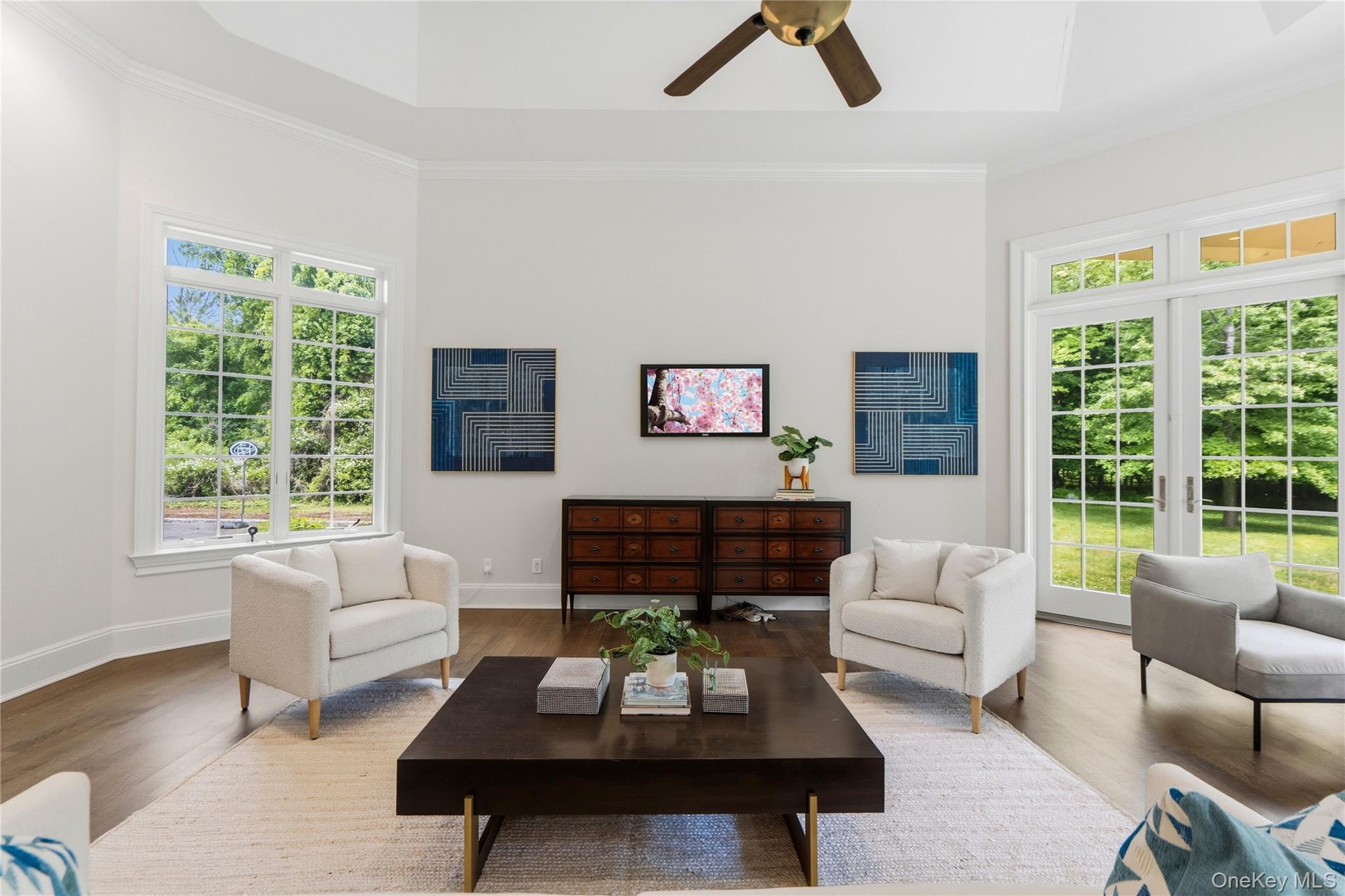 1960 Midlane Road South Syosset, NY 11791 - Photo 21 of 46 a living room with furniture and a large window