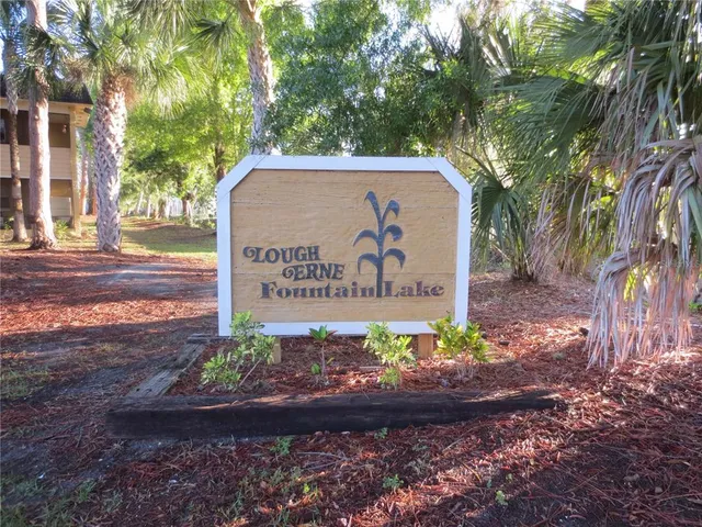 a sign on the side of the road