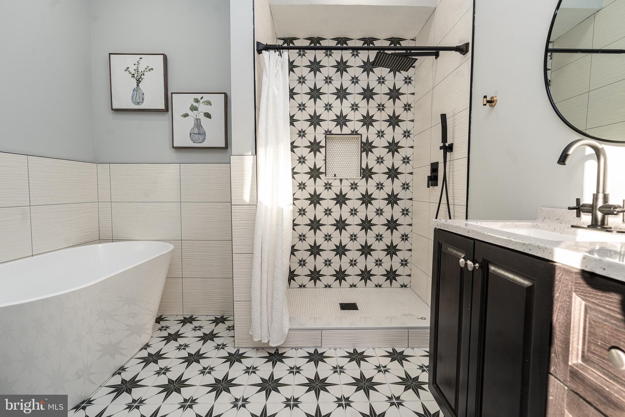 3910 Chatham Road Baltimore, MD 21207 - Photo 20 of 52 a bathroom with a sink a toilet and shower
