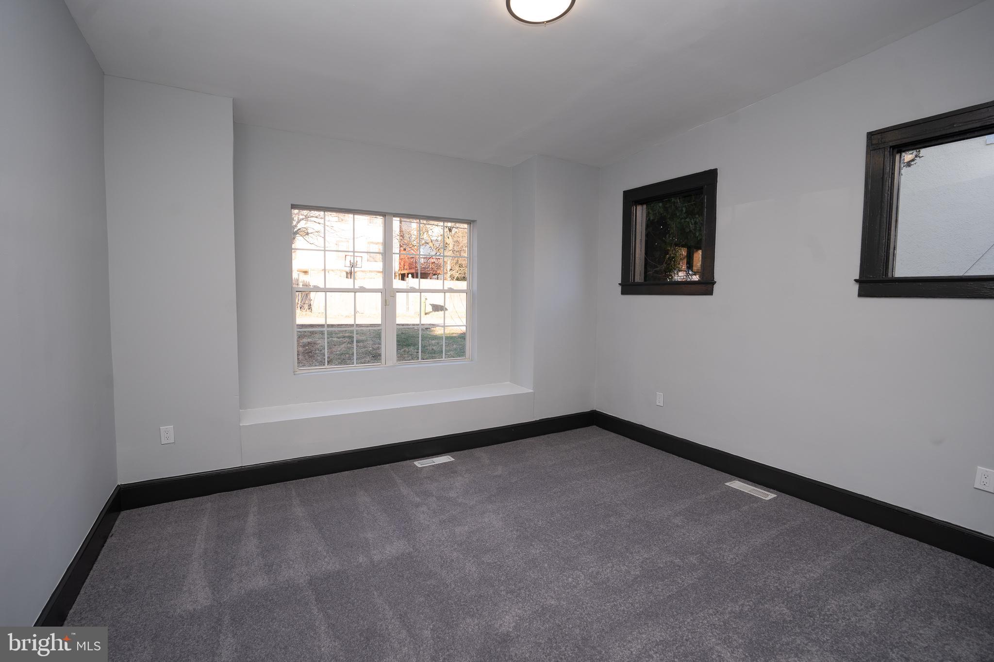 3910 Chatham Road Baltimore, MD 21207 - Photo 40 of 52 an empty room with a window