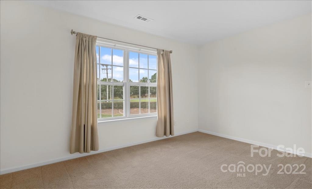1224 Afternoon Sun Road Matthews, NC 28104 - Photo 14 of 22 an empty room with a window